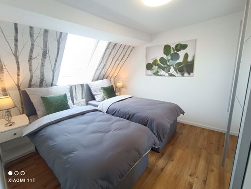 Zwei einzelne Betten im zweiten Schlafzimmer